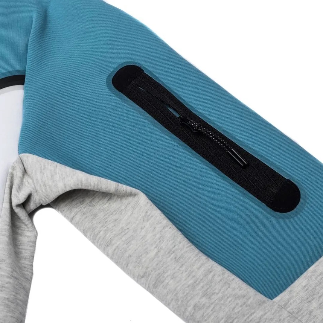 survêtement Nike TECH FLEECE - Réf. CU4495-494. Couleur : Bleu ciel. Détails. - Taille élastique – Image 4